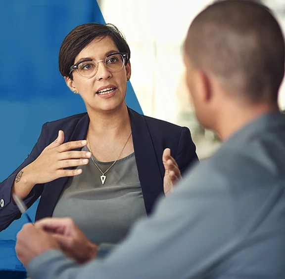 Photo of woman talking with a man